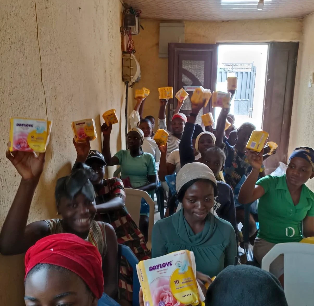 Participants with sanitary products during the 100 Girls initiative