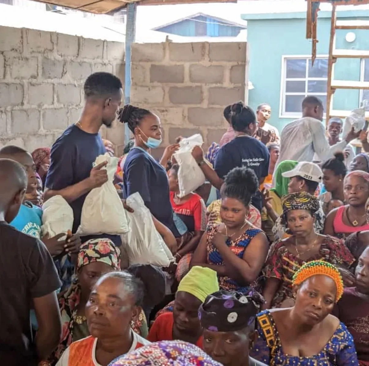 Volunteers sharing support with community members in Makoko