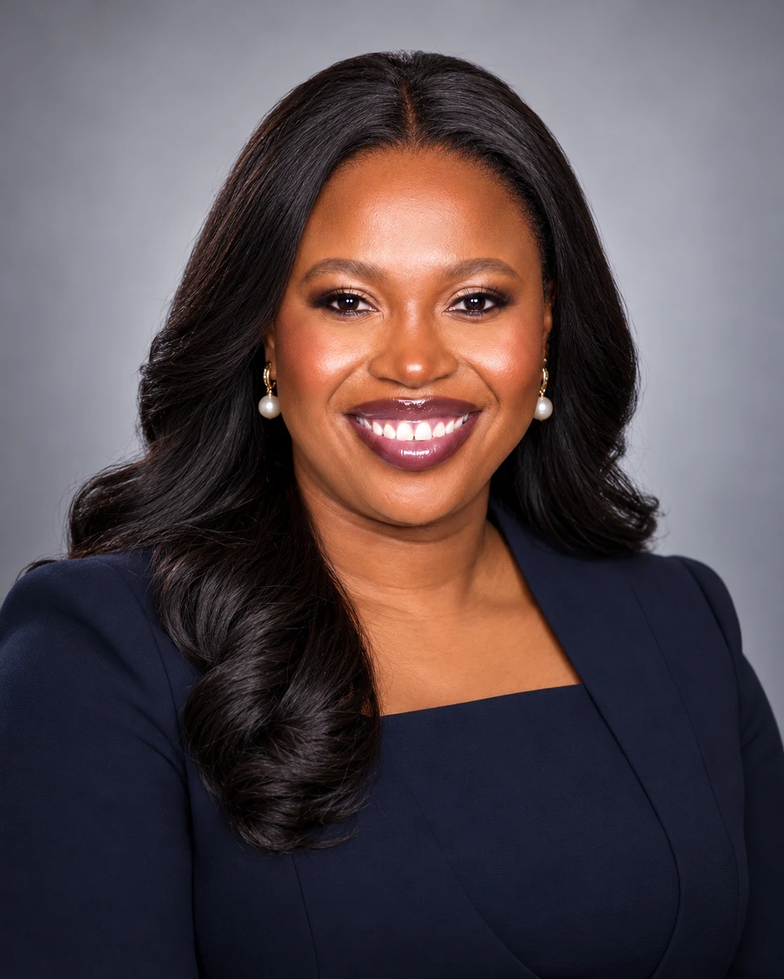 Regina Anyaso in her navy executive portrait